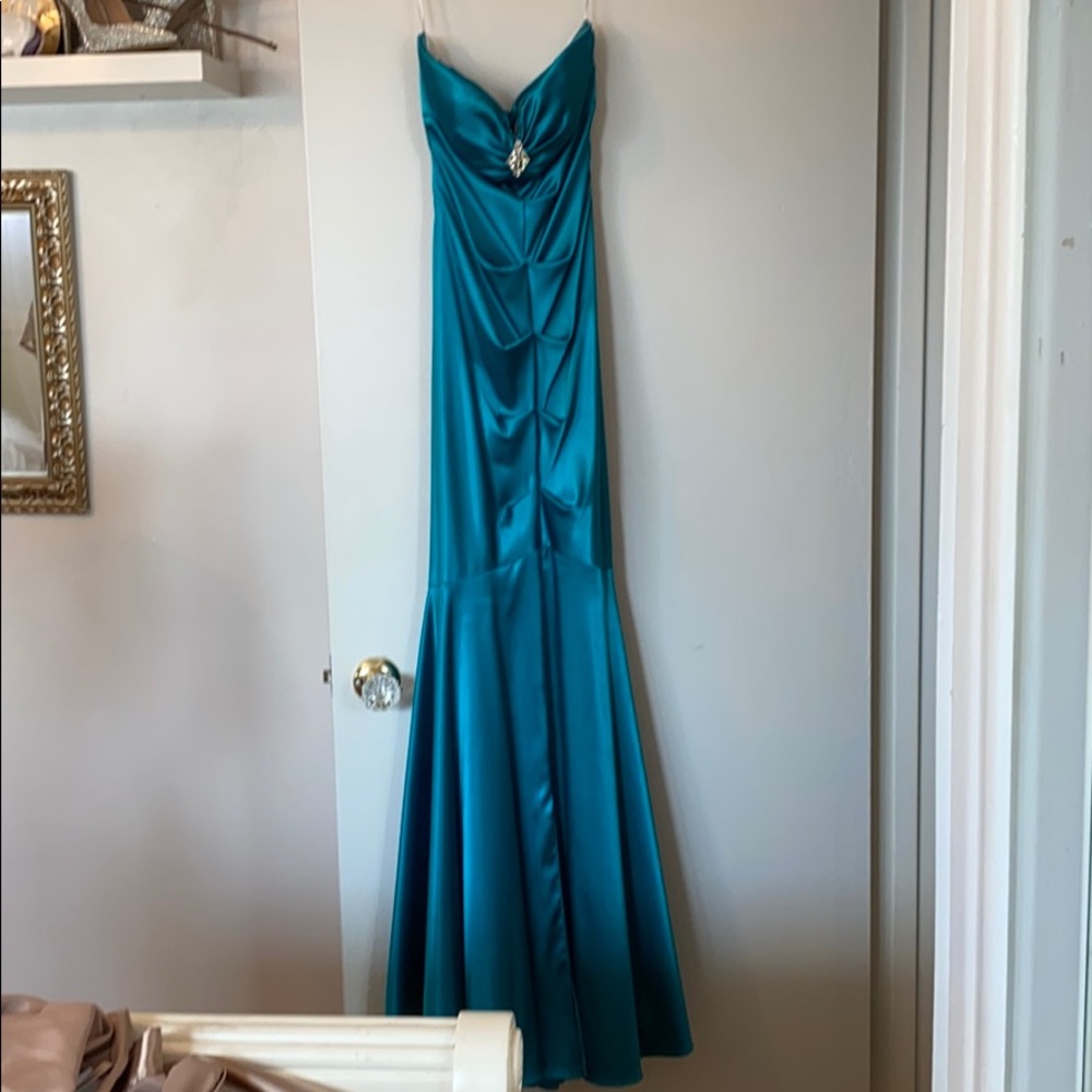 Turquoise dress.